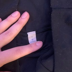 Size 6, lulu lemon cropped black leggings.